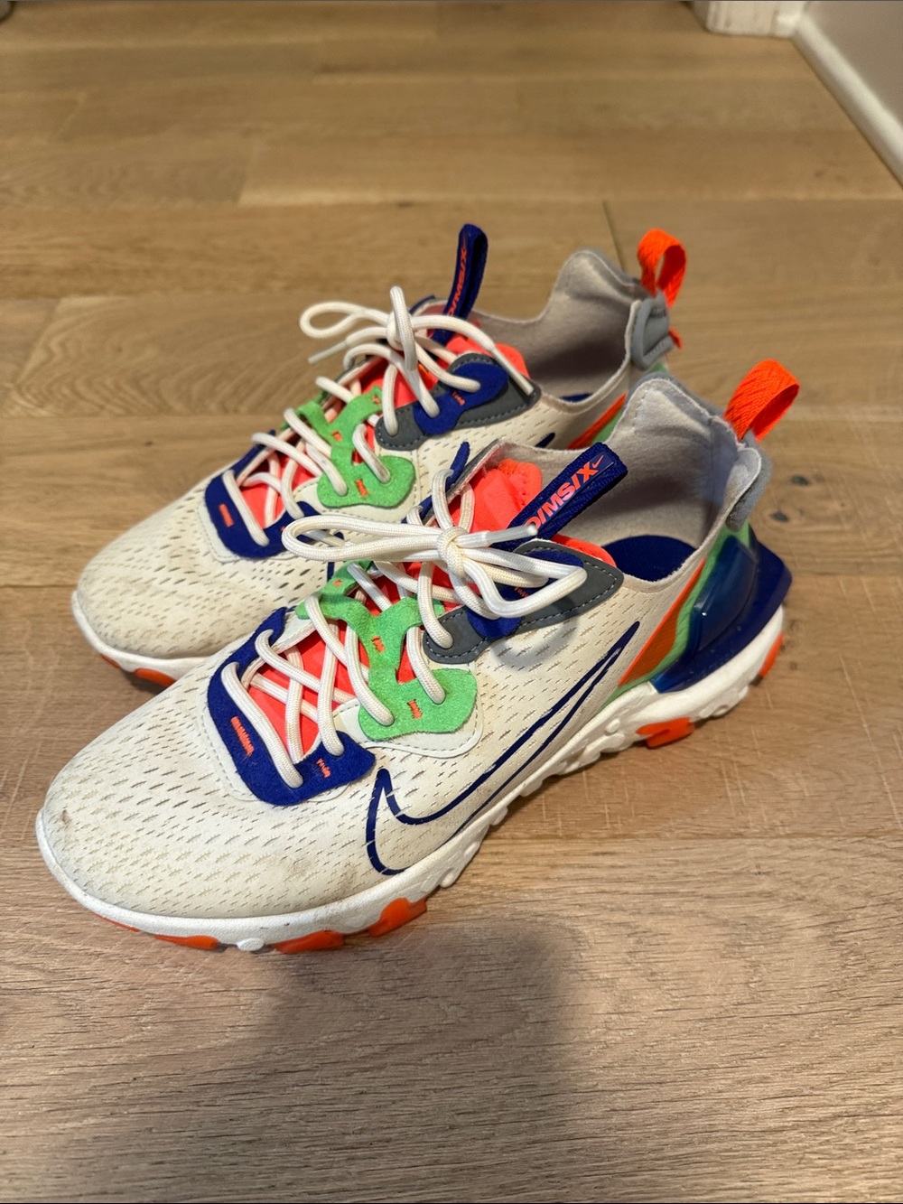 Nike Women’s White D/MS/X Sneakers with Blue, Orange and Green Accents